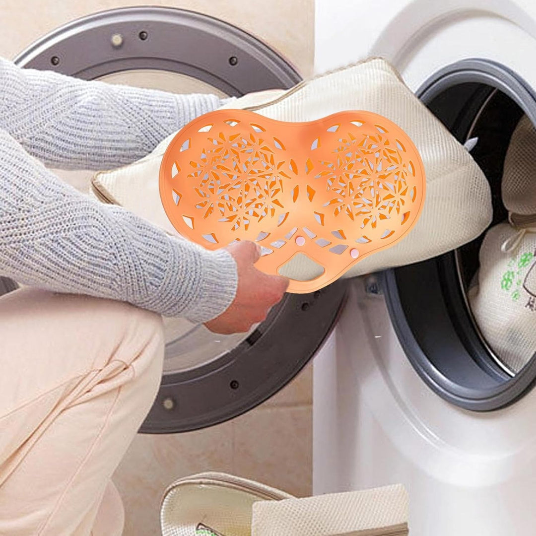 Orange BH-tvättkasse används i tvättmaskin