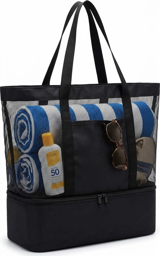 Strandväska packad med handduk, solkräm och solglasögon