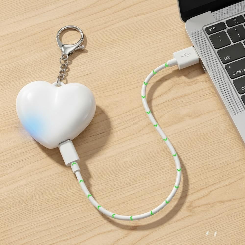 Hjärtformad väsklampa laddas via USB till laptop