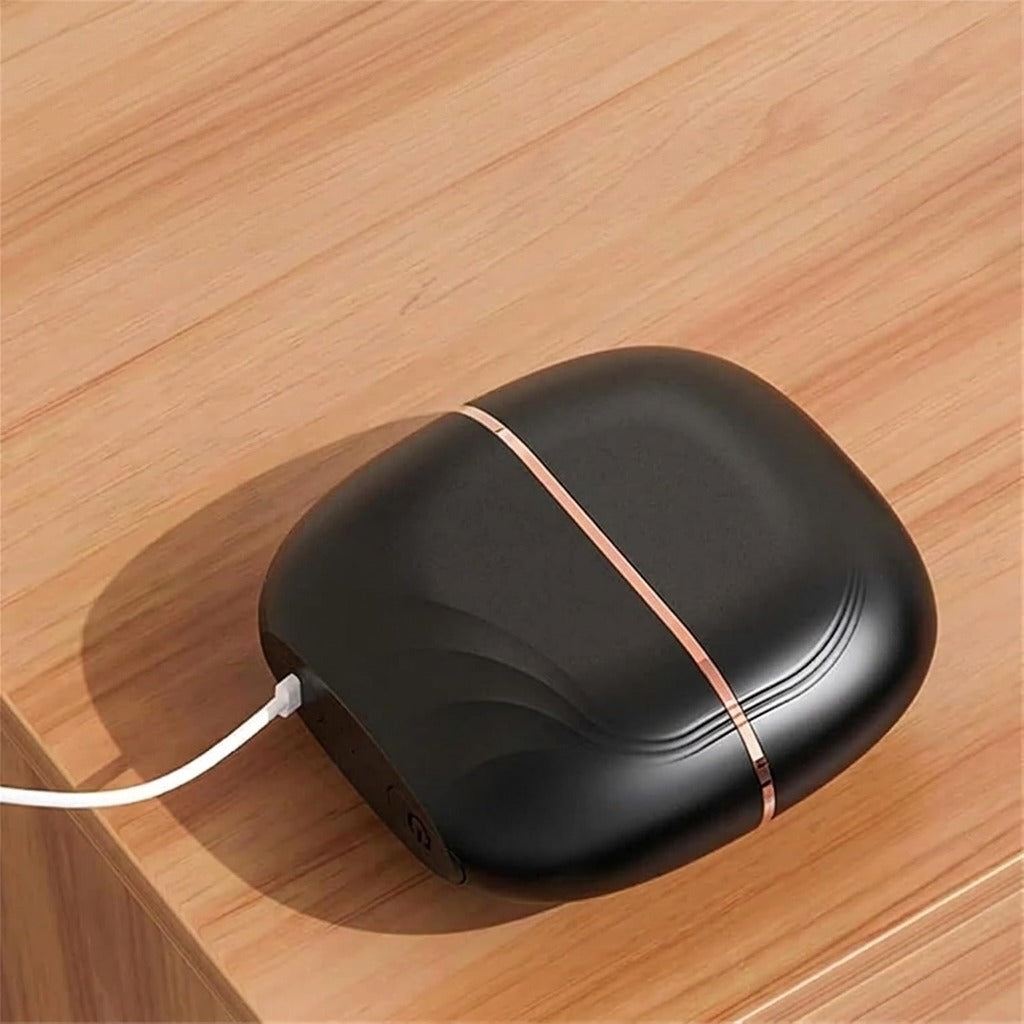 Svart hårrätarborste laddas med USB-C