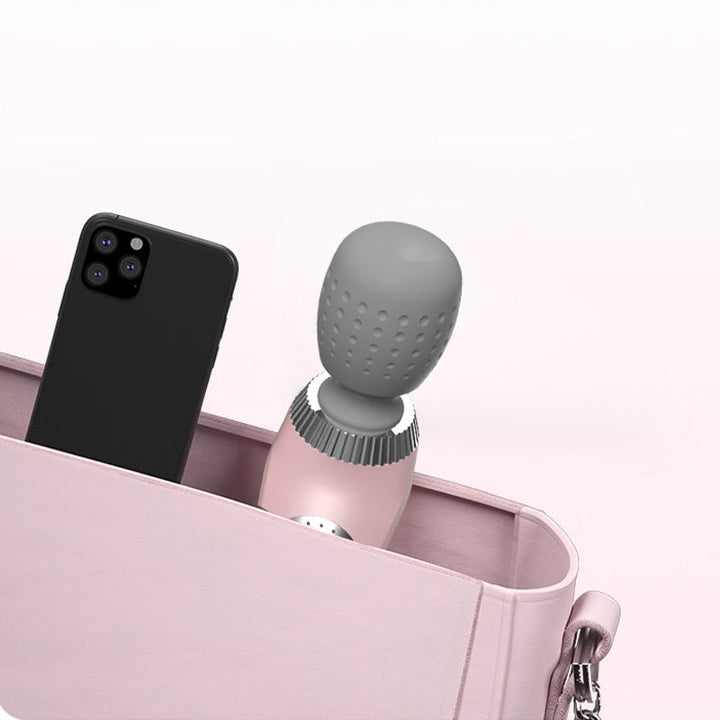 Rosa vibrationsmassager i väska – portabel